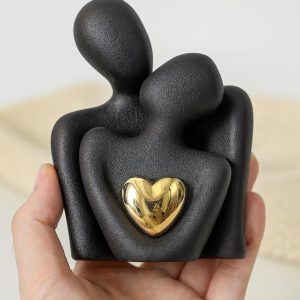 Ceramic couple figurine with golden heart small black